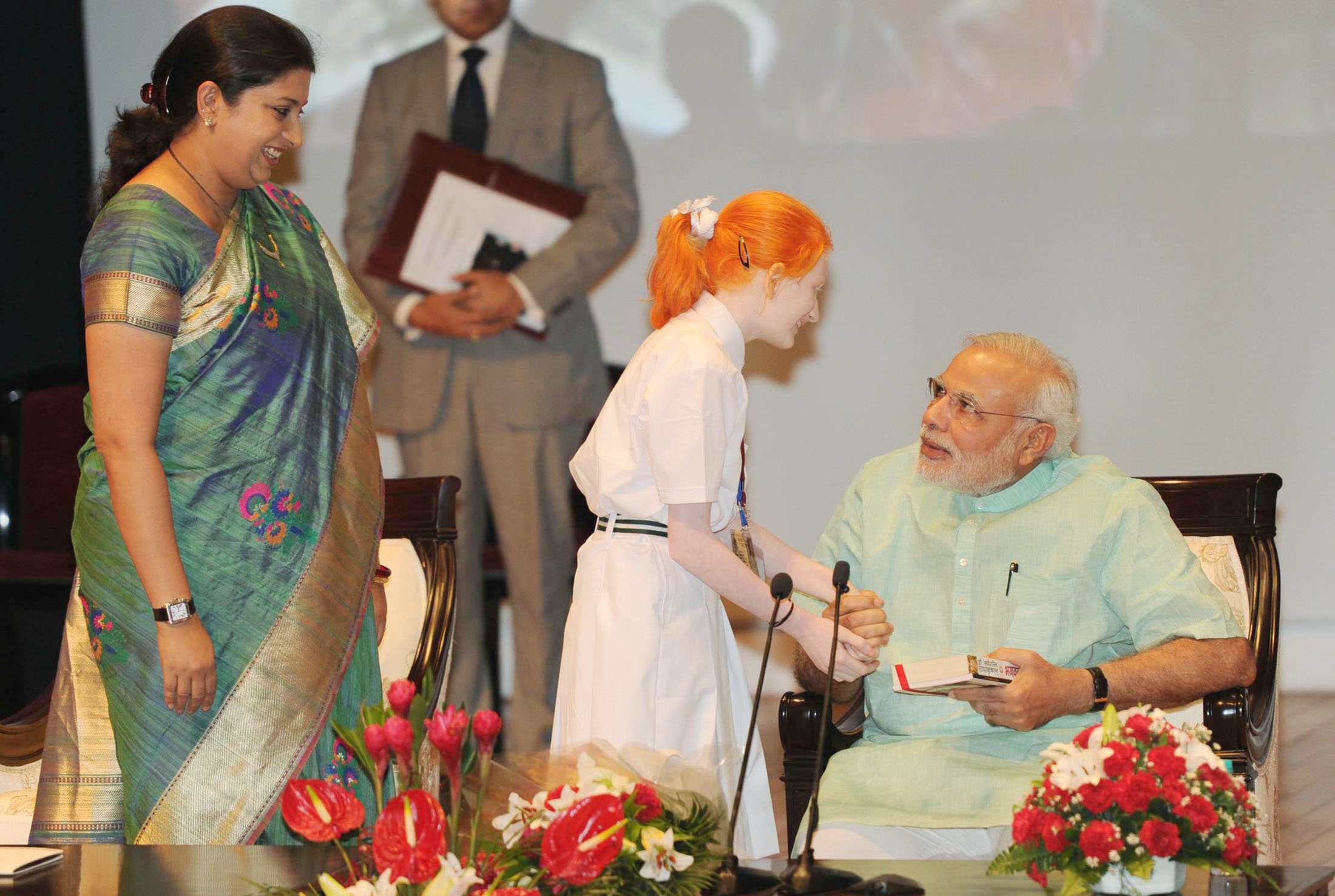 PM Narendra Modi giving the memento to a girl child, at the “Teachers’ Day”