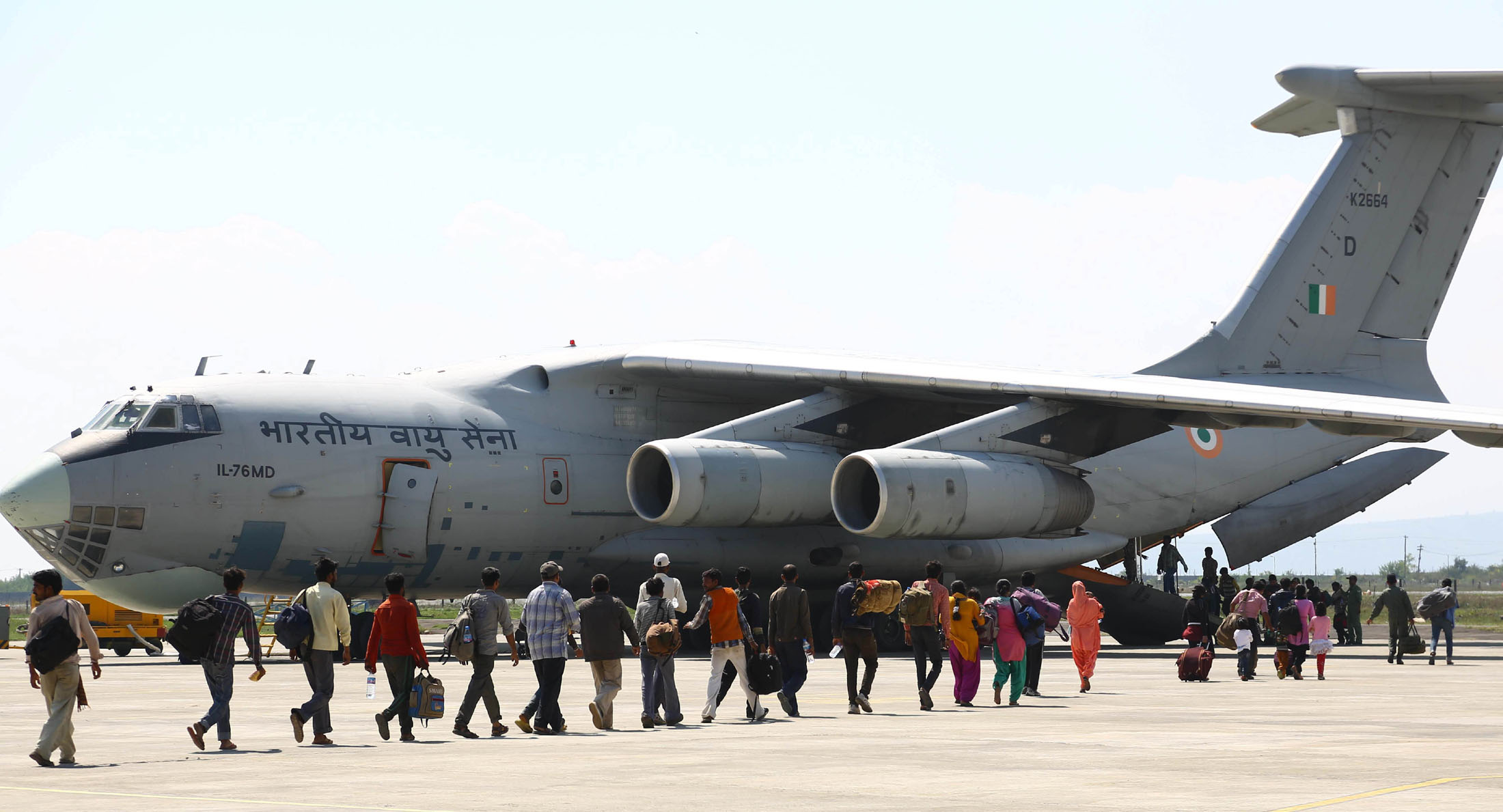 A long queue of the rescued people from flood ravaged Jammu & Kashmir boarding the IAF’s IL-76 transport aircraft