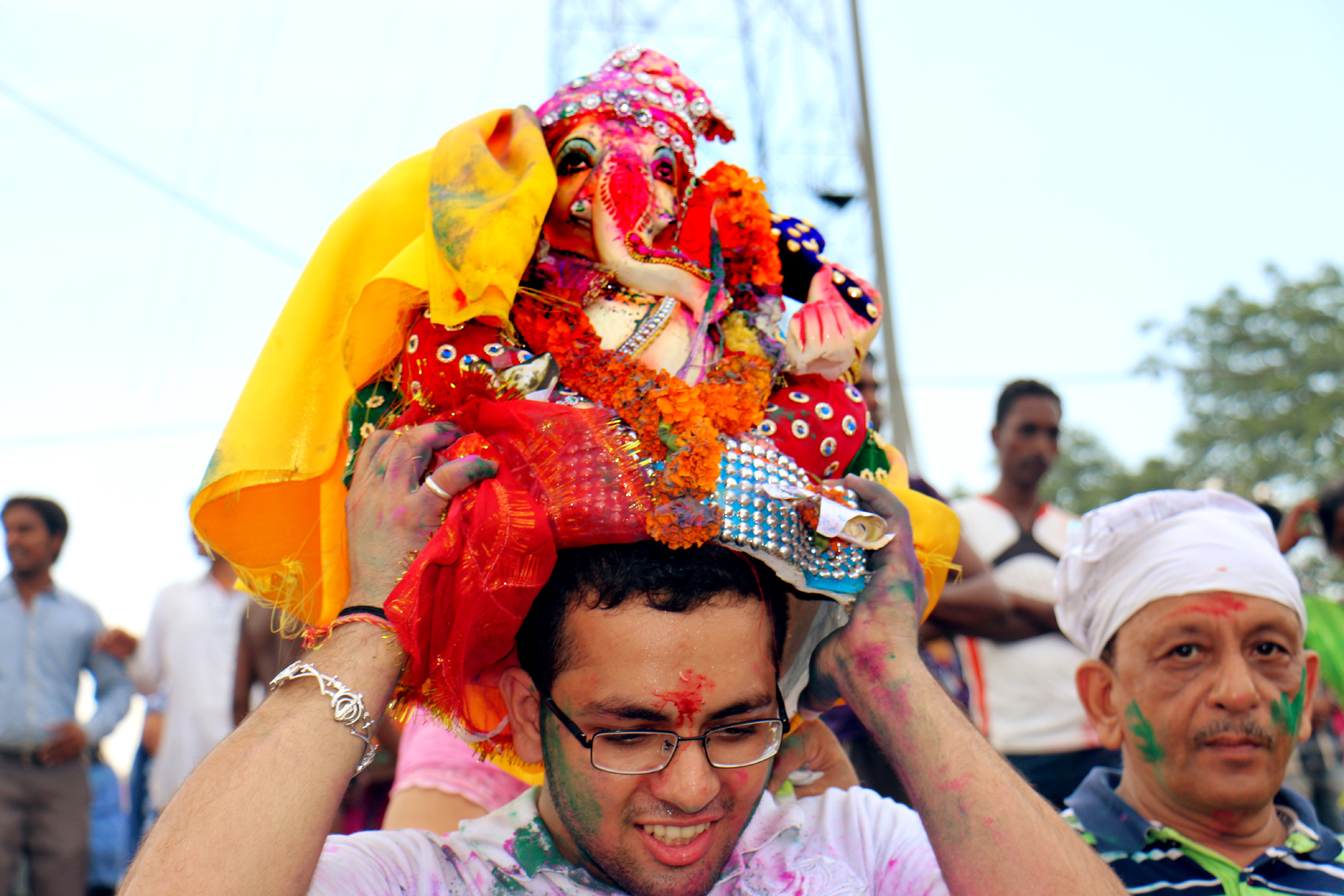 Devotees immersing Lord Ganeshas idol after Ganesh Chaturthi Celebrations at Yamuna river in New Delhi